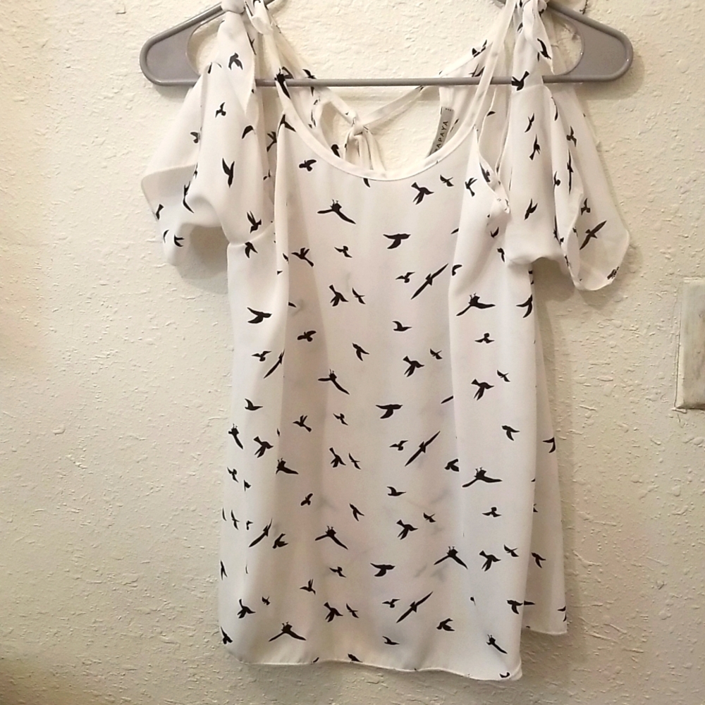 White top with blue birds